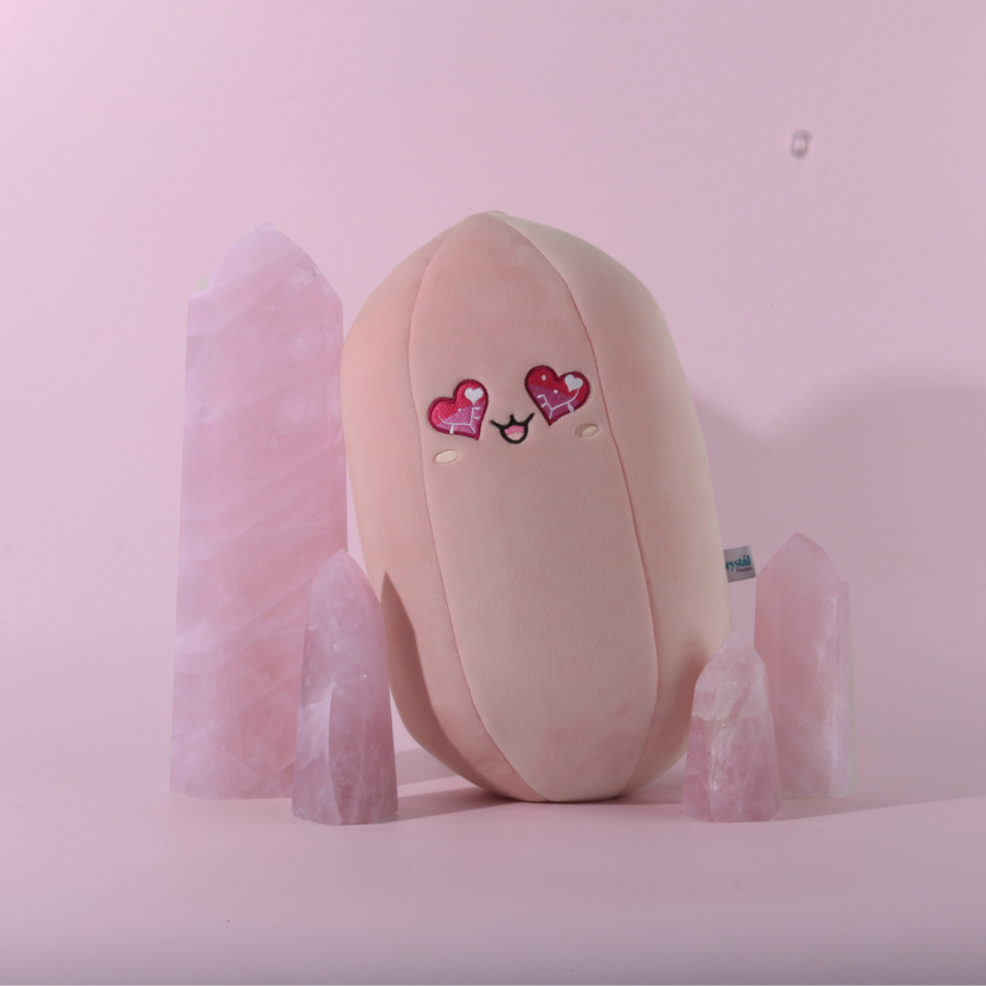 Rosie the Rose Quartz, a pink 14 inch Crystal Plushie with heart eyes