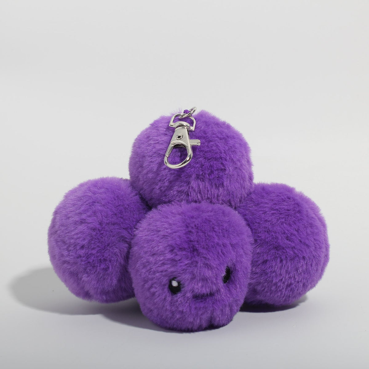 Boba, a plush grape agate bag charm by Crystal Plushie