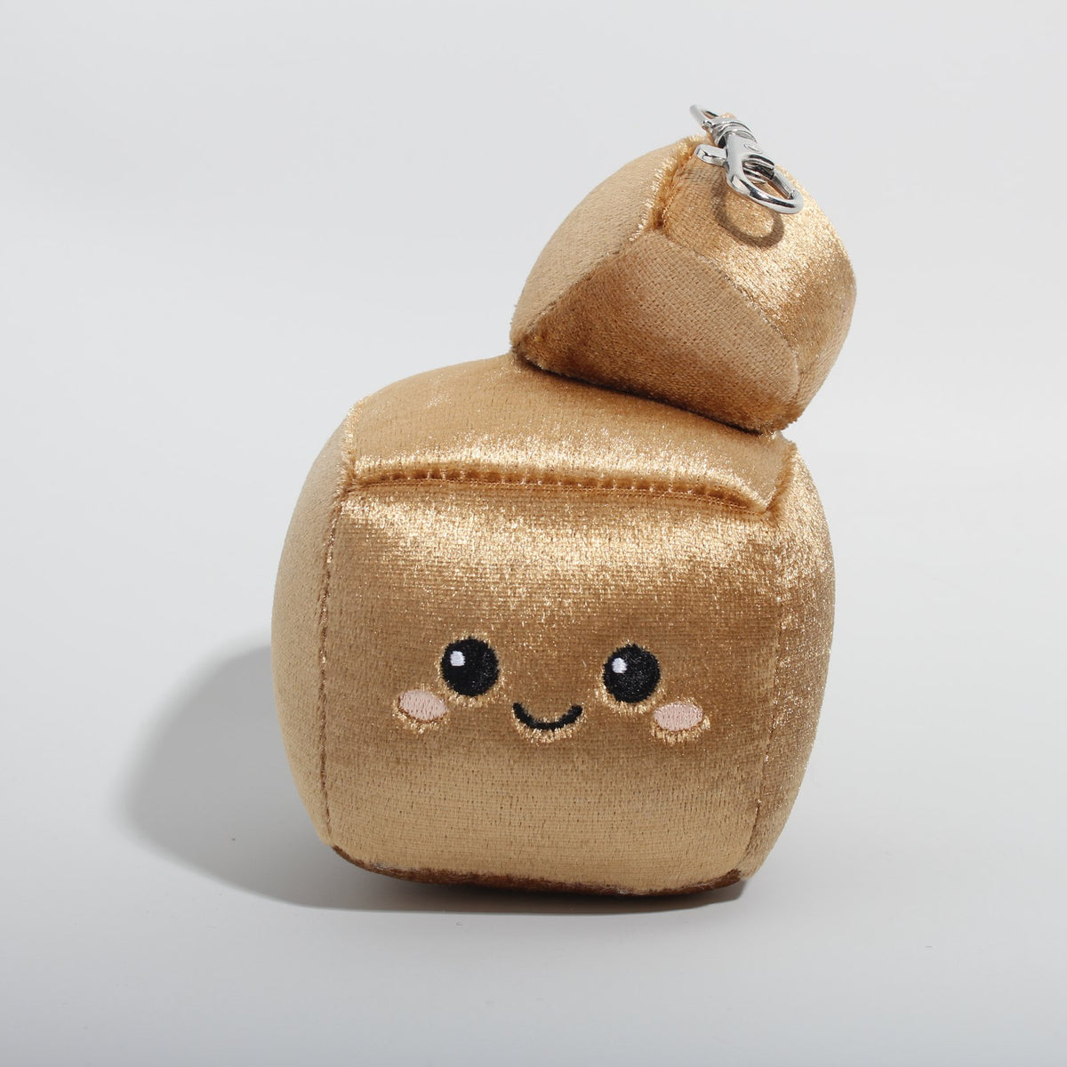 Sparky, a plush pyrite bag charm by Crystal Plushie