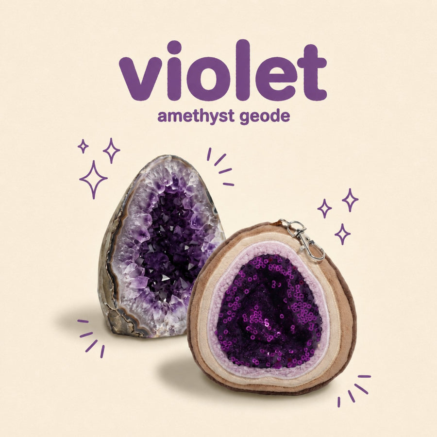 Violet the amethyst geode bag charm beside a real amethyst geode